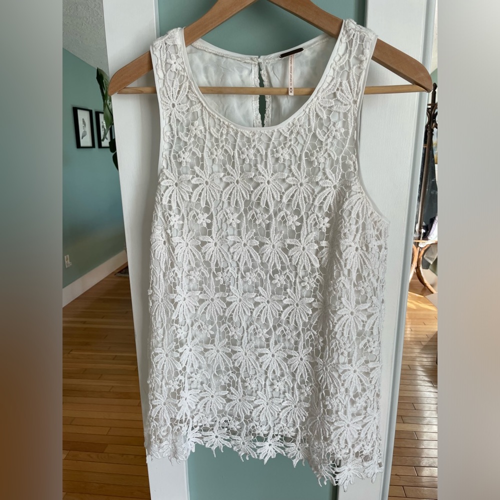 Temperance – Lacey, white tank top.
